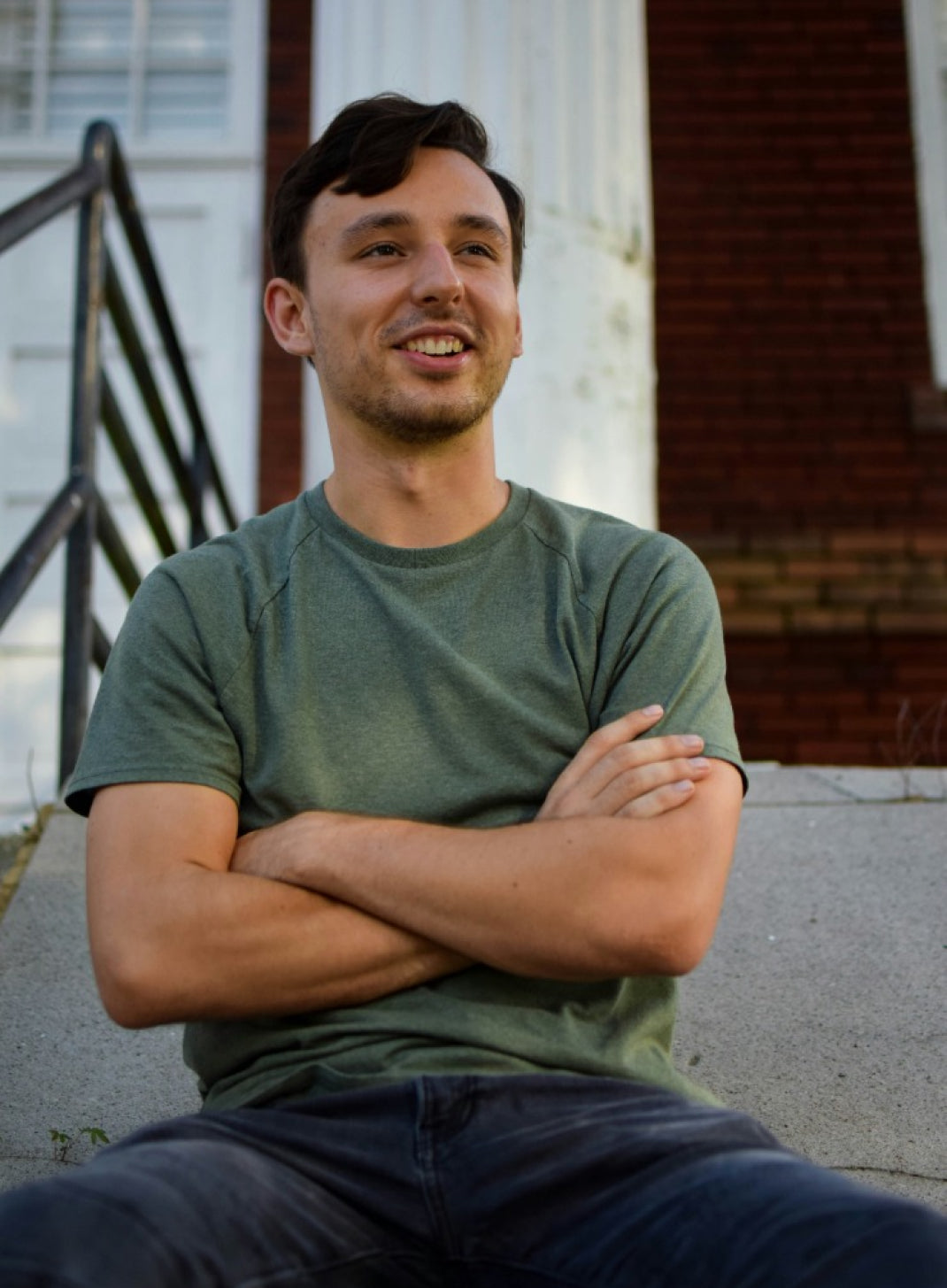 Portrait of man in green tee